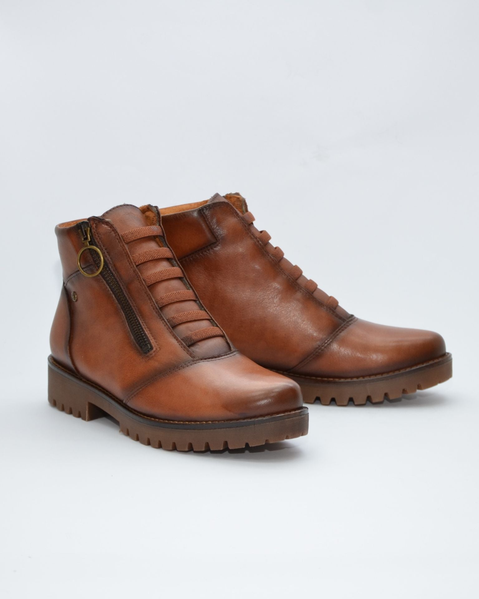 BOTINES DE MUJER PLANOS CON CREMALLERA EN COLOR CUERO