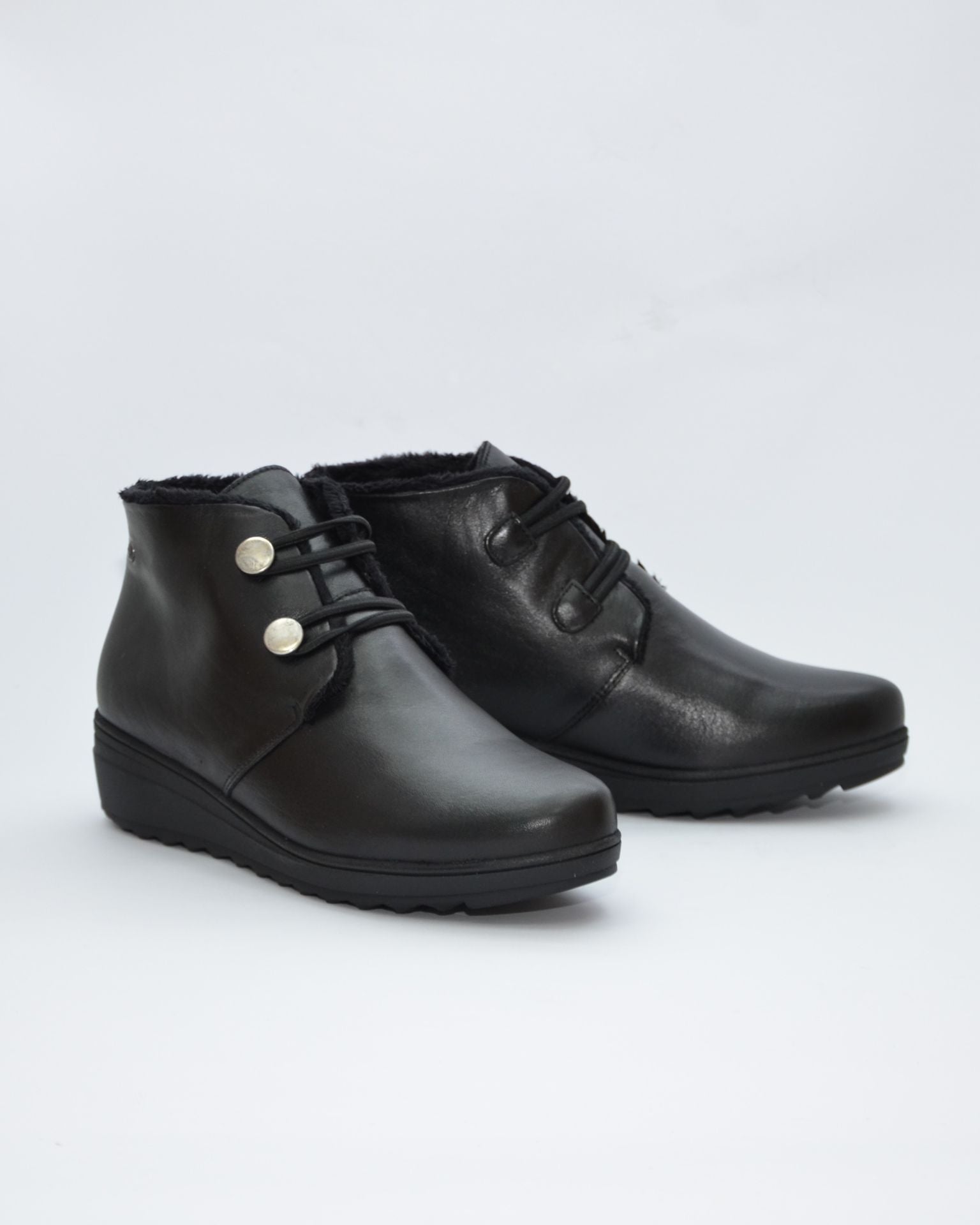 BOTINES DE MUJER CON CUÑA Y CIERRE DE ELASTICOS COLOR NEGRO