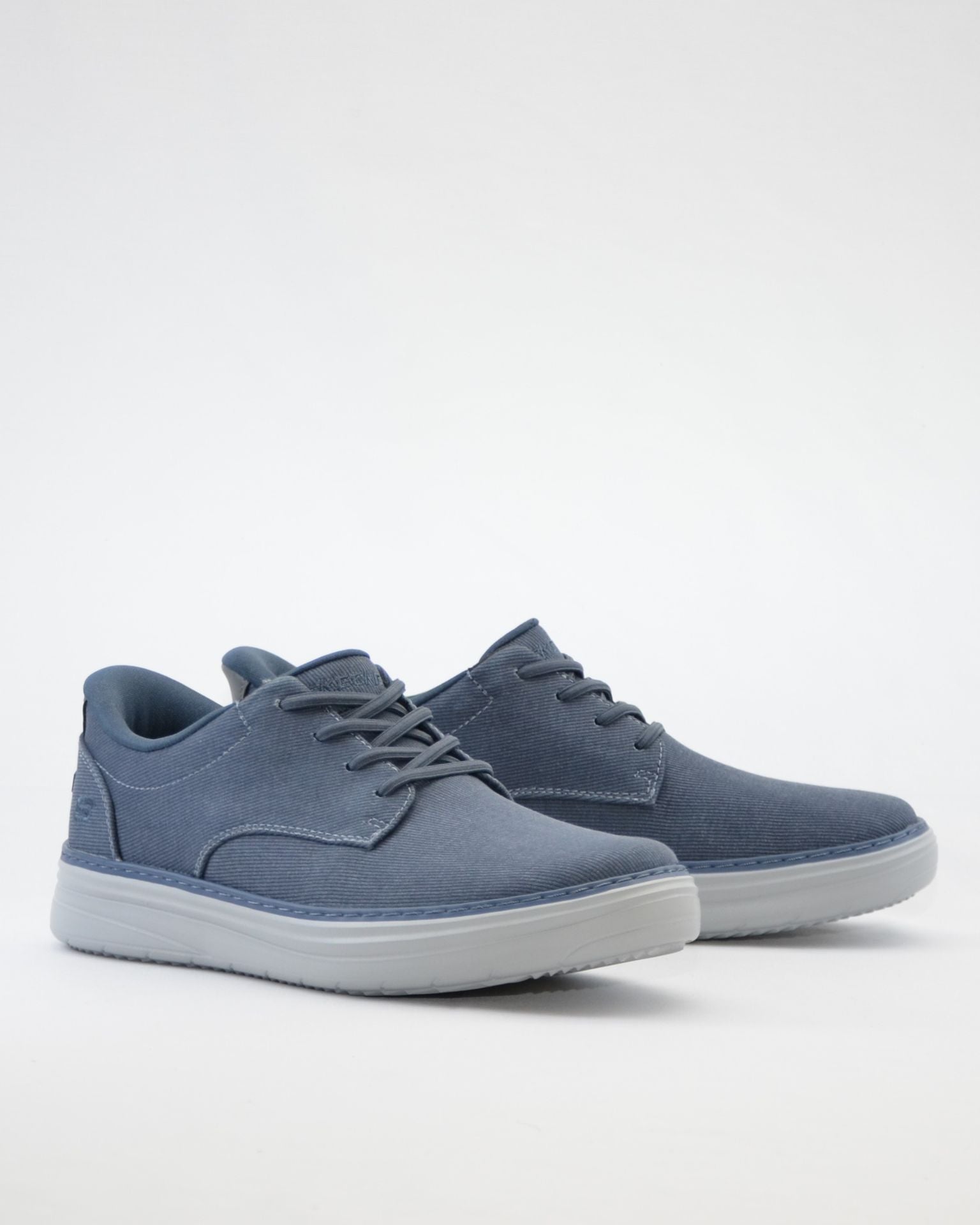 ZAPATILLA DE LONA SIN CORDONES AZUL SKECHERS 205701 NVY SLIP-INS