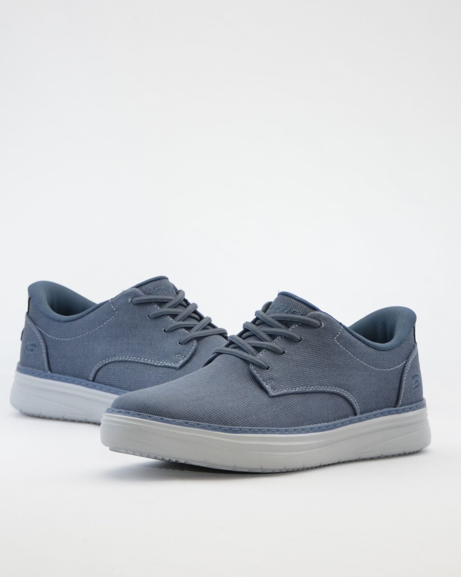 ZAPATILLA DE LONA SIN CORDONES AZUL SKECHERS 205701 NVY SLIP-INS