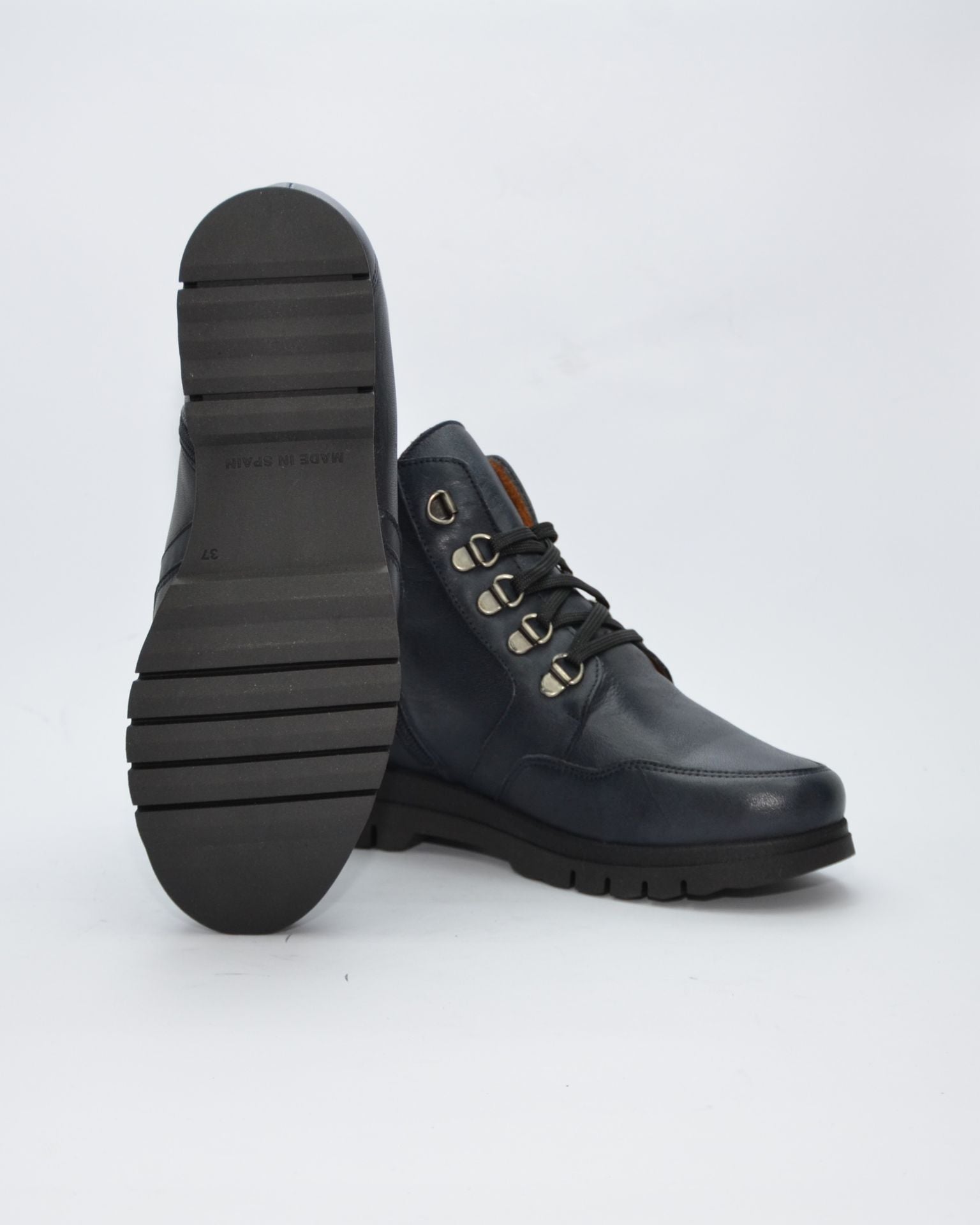 BOTINES DE MUJER EN COLOR AZUL MARINO PLANOS CON CORDONES