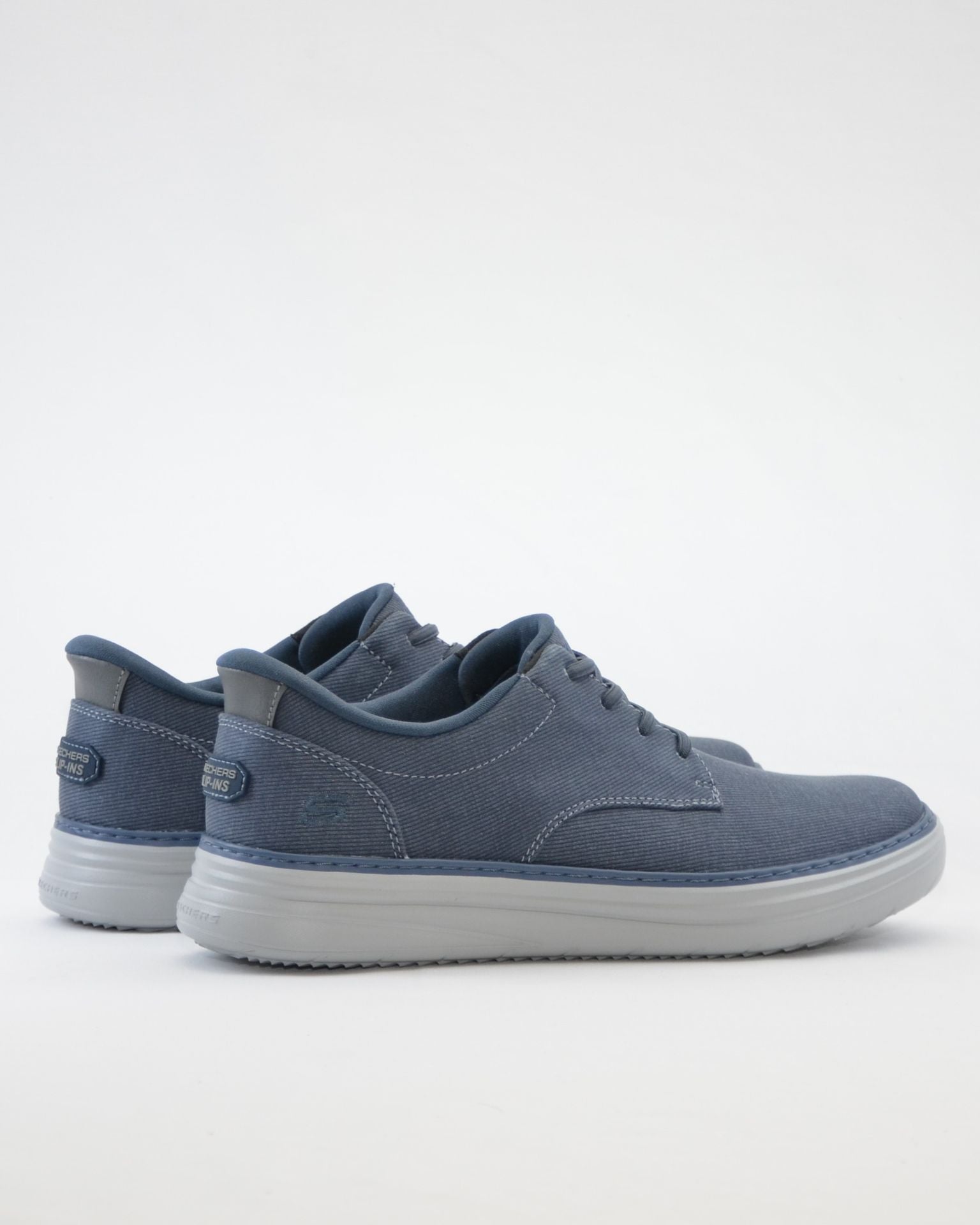 ZAPATILLA DE LONA SIN CORDONES AZUL SKECHERS 205701 NVY SLIP-INS