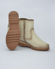 BOTINES DE MUJER PLANOS CON CREMALLERA EN COLOR HIELO