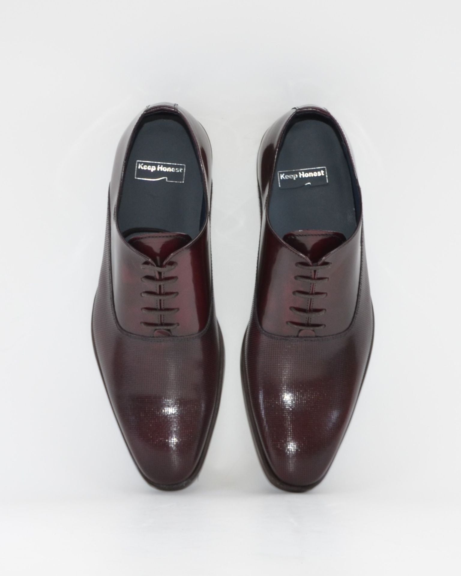 ZAPATO HOMBRE OXFORD FLORENTIC BURDEOS MICROPERFORADO