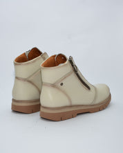 BOTINES DE MUJER PLANOS CON CREMALLERA EN COLOR HIELO