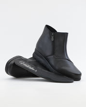 BOTINES DE MUJER CON CUÑA BAJA Y CREMALLERA COLOR NEGRO VALERIAS 2801