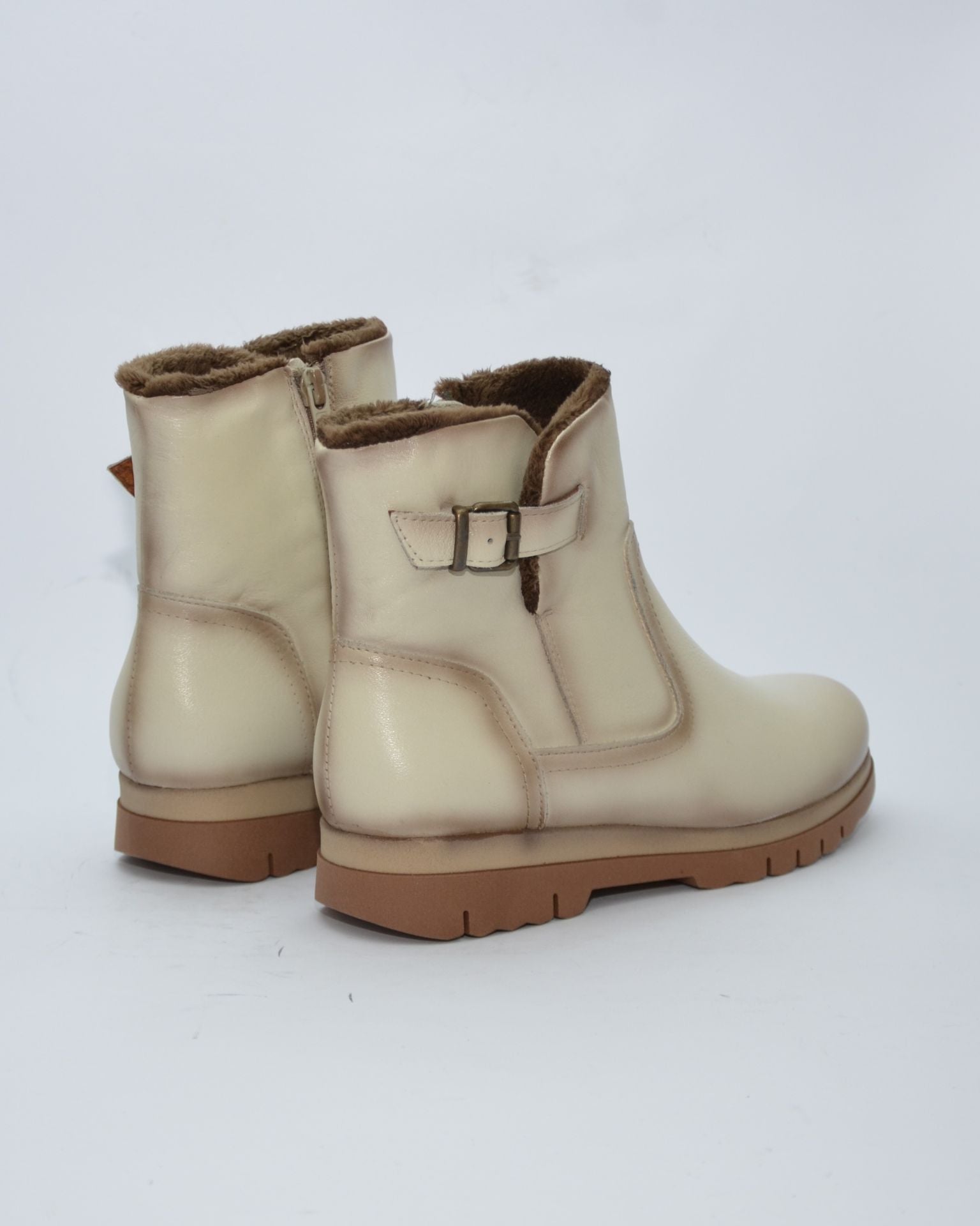 BOTINES DE MUJER PLANOS CON CREMALLERA EN COLOR HIELO