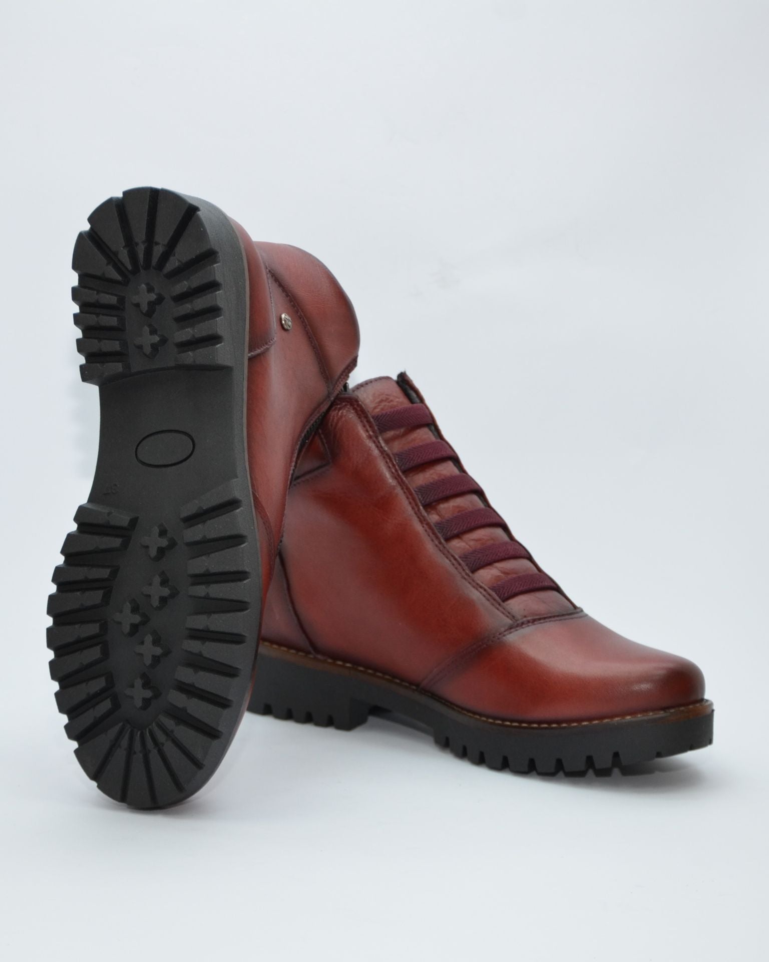 BOTINES DE MUJER PLANOS CON CREMALLERA EN COLOR BURDEOS